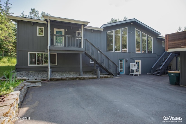 4450 Trapline Dr, Anchorage, AK 99516 - rear view of property featuring stairs and a patio