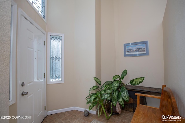 4450 Trapline Dr, Anchorage, AK 99516 - foyer entrance featuring tile patterned flooring and a towering ceiling