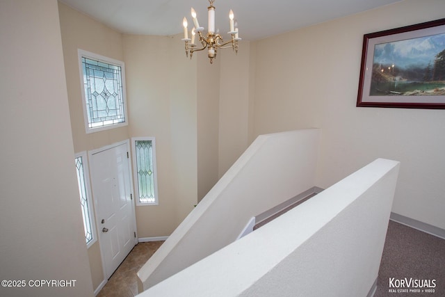 4450 Trapline Dr, Anchorage, AK 99516 - foyer entrance featuring a chandelier and plenty of natural light