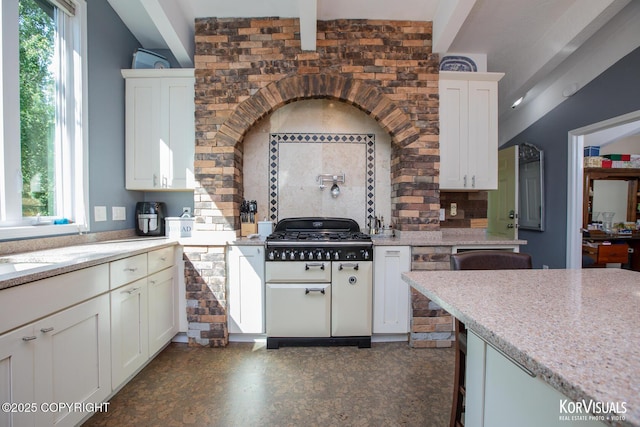 4450 Trapline Dr, Anchorage, AK 99516 - kitchen with tasteful backsplash, beamed ceiling, white cabinetry, and light stone counters