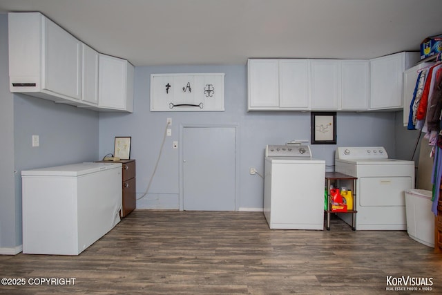 4450 Trapline Dr, Anchorage, AK 99516 - laundry room featuring washing machine and clothes dryer, cabinet space, and dark wood-style floors