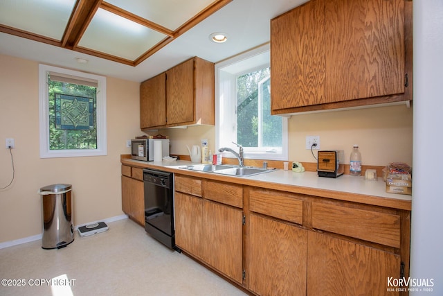 4450 Trapline Dr, Anchorage, AK 99516 - kitchen with dishwasher, light countertops, brown cabinetry, recessed lighting, and light flooring