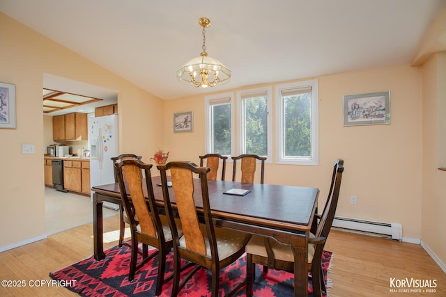 4450 Trapline Dr, Anchorage, AK 99516 - dining area with a baseboard radiator, light wood finished floors, and a chandelier