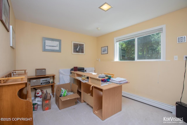 4450 Trapline Dr, Anchorage, AK 99516 - office area featuring a baseboard heating unit and carpet