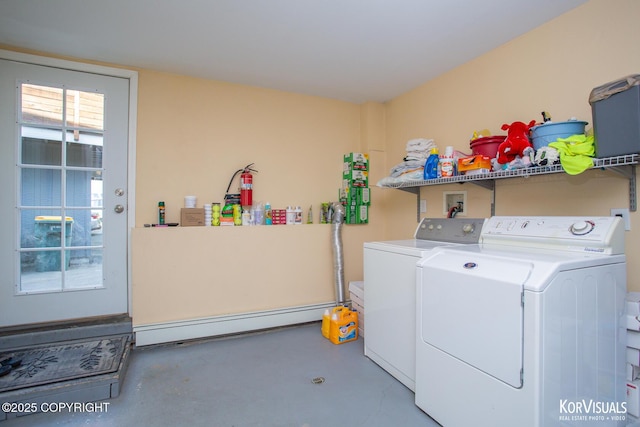 4450 Trapline Dr, Anchorage, AK 99516 - laundry room featuring a baseboard heating unit and washer and dryer