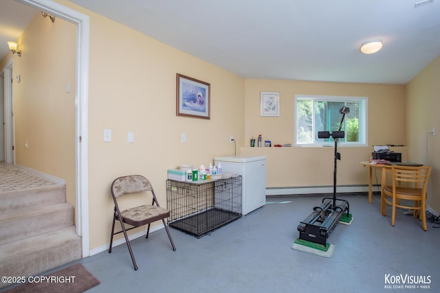 4450 Trapline Dr, Anchorage, AK 99516 - living area featuring a baseboard heating unit and an office area