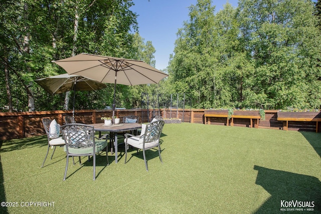 4450 Trapline Dr, Anchorage, AK 99516 - view of yard with outdoor dining area