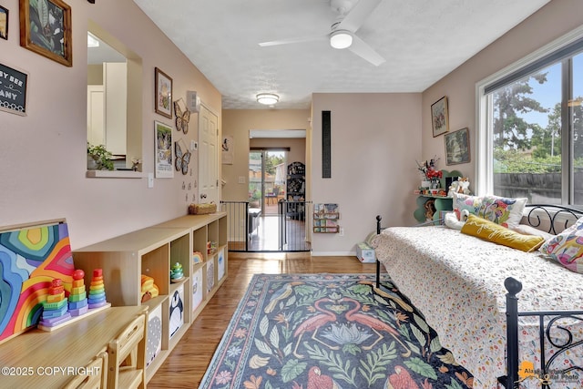 1124 Fred Cir, Anchorage, AK 99515 - bedroom with wood finished floors and baseboards