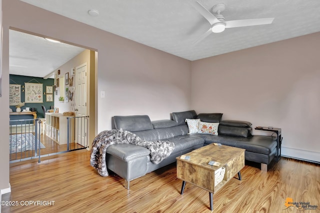 1124 Fred Cir, Anchorage, AK 99515 - living area with wood finished floors and ceiling fan
