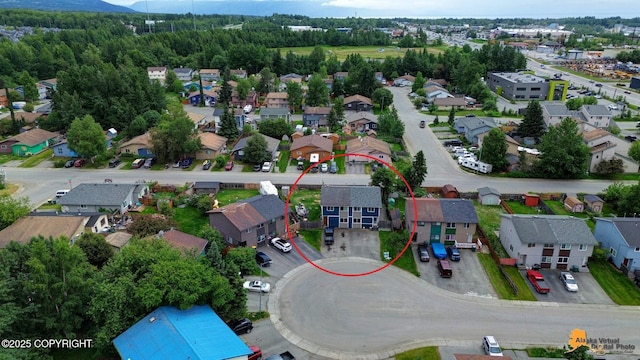 1124 Fred Cir, Anchorage, AK 99515 - aerial view of residential area with a mountainous background