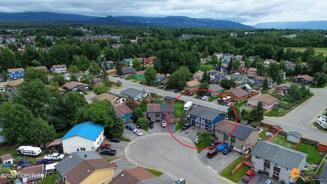 1124 Fred Cir, Anchorage, AK 99515 - aerial view of residential area featuring a mountainous background