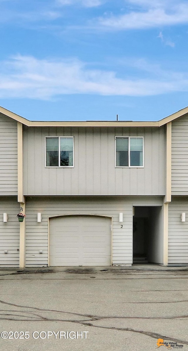 12231 Johns Rd # 2, Anchorage, AK 99515 - view of front of property with a garage