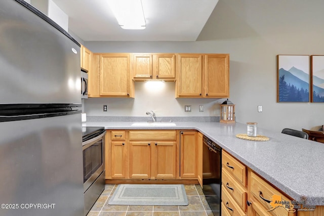 12231 Johns Rd # 2, Anchorage, AK 99515 - kitchen featuring appliances with stainless steel finishes, light countertops, a peninsula, and light brown cabinets