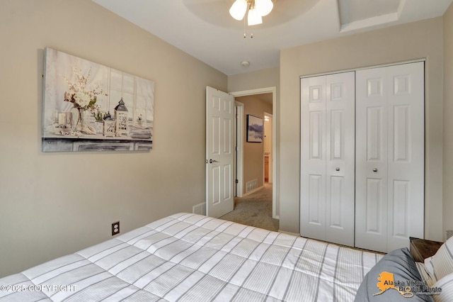 12231 Johns Rd # 2, Anchorage, AK 99515 - bedroom with a closet, carpet flooring, and a ceiling fan