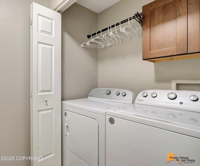 12231 Johns Rd # 2, Anchorage, AK 99515 - washroom featuring cabinet space and independent washer and dryer