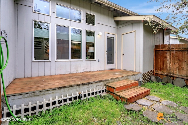 12231 Johns Rd # 2, Anchorage, AK 99515 - view of exterior entry featuring a wooden deck