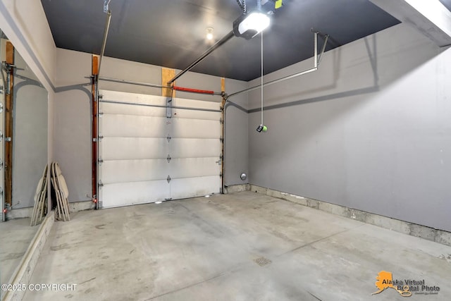 12231 Johns Rd # 2, Anchorage, AK 99515 - garage featuring a garage door opener