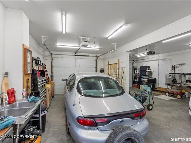 3872 N Charley Dr, Wasilla, AK 99654 - garage featuring a sink