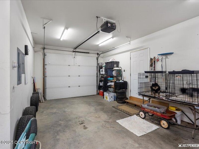 3872 N Charley Dr, Wasilla, AK 99654 - garage with a garage door opener and electric panel