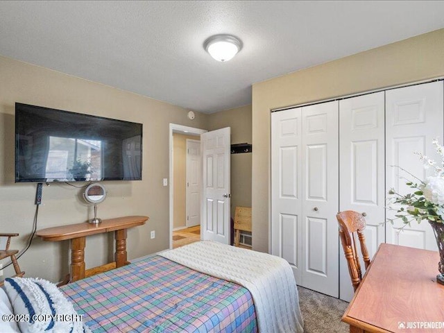 3872 N Charley Dr, Wasilla, AK 99654 - bedroom featuring a closet and light carpet