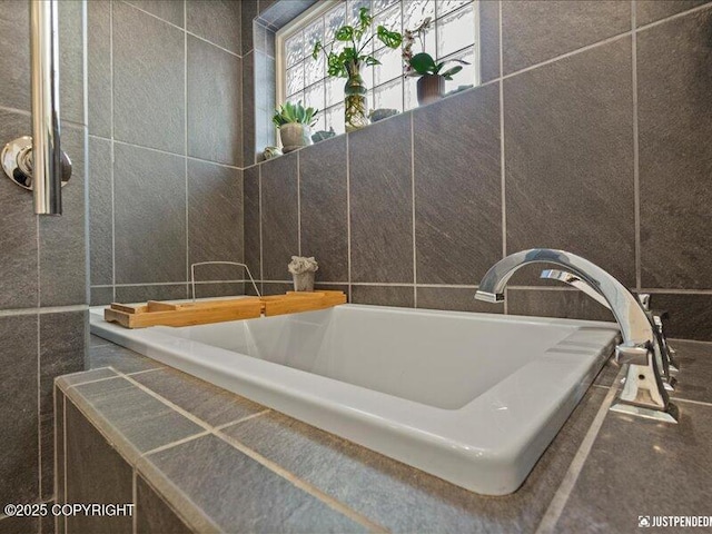 3872 N Charley Dr, Wasilla, AK 99654 - bathroom with tile walls and a tub to relax in