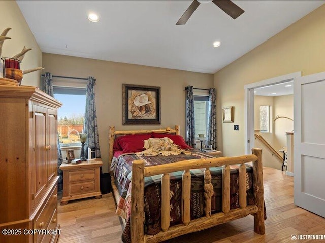 3872 N Charley Dr, Wasilla, AK 99654 - bedroom featuring recessed lighting, light wood-style flooring, lofted ceiling, and a ceiling fan