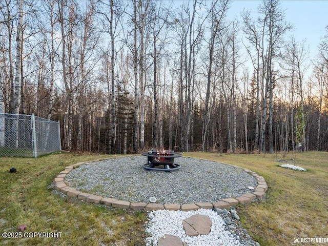 3872 N Charley Dr, Wasilla, AK 99654 - view of yard featuring a fire pit