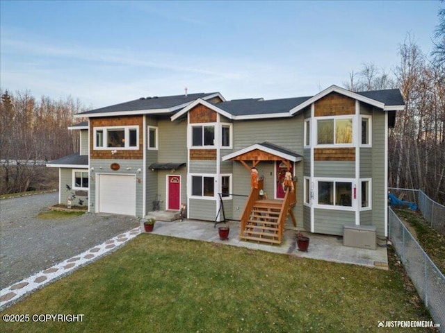 3872 N Charley Dr, Wasilla, AK 99654 - view of front of home featuring a garage and gravel driveway