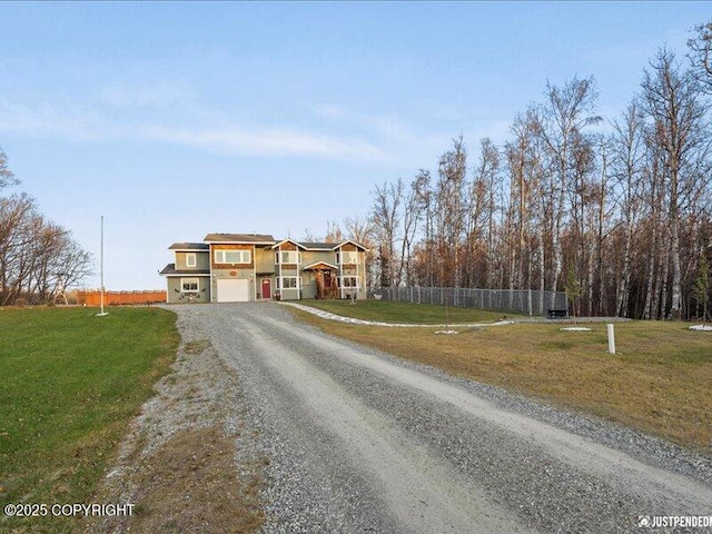 3872 N Charley Dr, Wasilla, AK 99654 - view of front of house featuring driveway and an attached garage