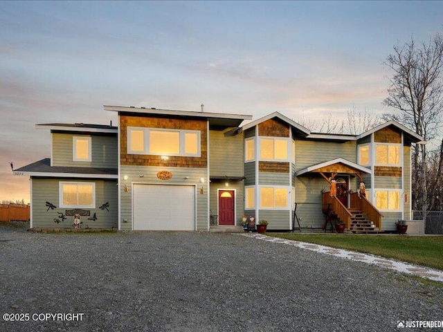3872 N Charley Dr, Wasilla, AK 99654 - view of front of home with an attached garage and gravel driveway