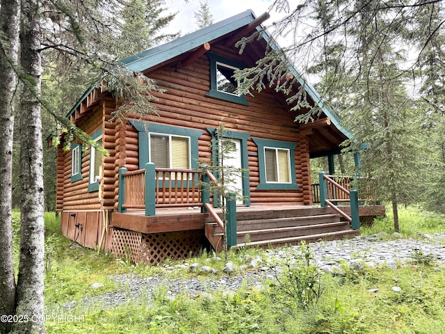 15700 Wild Salmon Way, Ninilchik, AK 99639 - view of front of home with a deck and log siding
