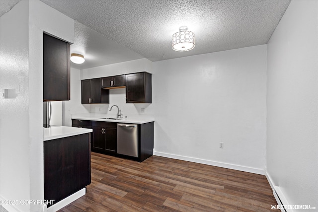 3100 Ward Pl Unit 6, Anchorage, AK 99517 - kitchen featuring dishwasher, a textured ceiling, dark wood-style flooring, light countertops, and dark brown cabinetry