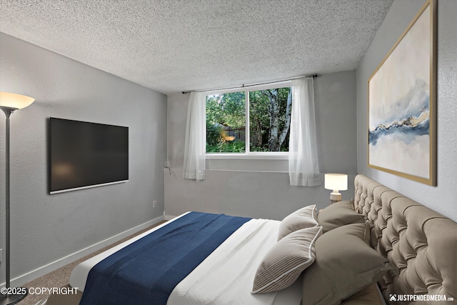 3100 Ward Pl Unit 6, Anchorage, AK 99517 - bedroom with a textured ceiling and baseboards