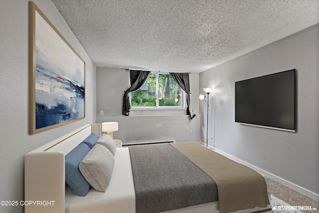 3100 Ward Pl Unit 6, Anchorage, AK 99517 - carpeted bedroom featuring a textured ceiling and a baseboard radiator