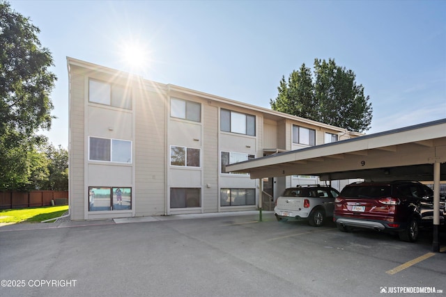3100 Ward Pl Unit 6, Anchorage, AK 99517 - view of building exterior with covered parking