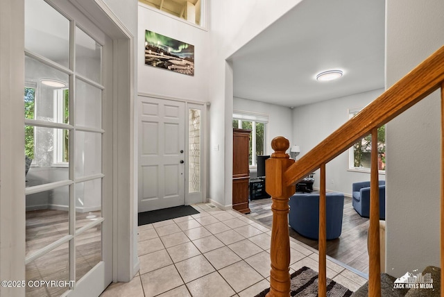 250 Botanical Cir, Anchorage, AK 99515 - foyer entrance featuring light tile patterned floors and baseboards