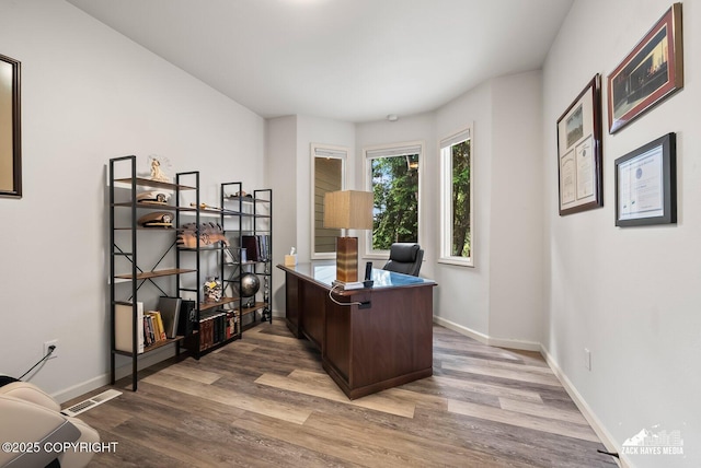 250 Botanical Cir, Anchorage, AK 99515 - office with wood finished floors and baseboards