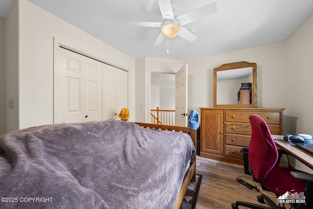 250 Botanical Cir, Anchorage, AK 99515 - bedroom with dark wood finished floors, a closet, and a ceiling fan