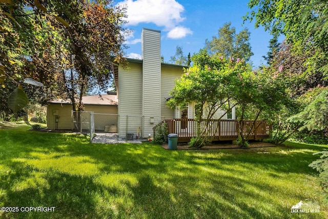 250 Botanical Cir, Anchorage, AK 99515 - rear view of property with a deck and a chimney