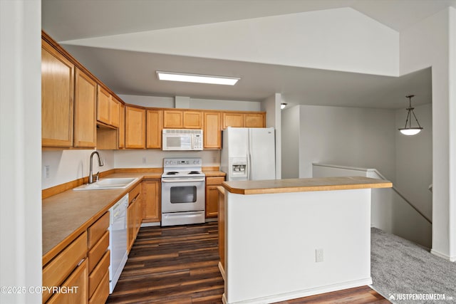221 Whisper Ridge Cir # A, Anchorage, AK 99504 - kitchen featuring white appliances, dark wood finished floors, a center island, and light countertops