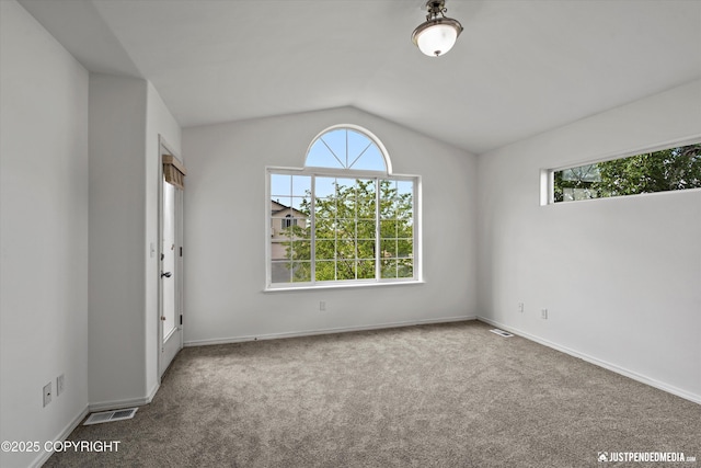 221 Whisper Ridge Cir # A, Anchorage, AK 99504 - carpeted empty room featuring healthy amount of natural light and lofted ceiling