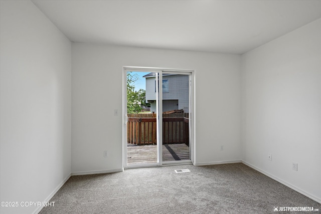 221 Whisper Ridge Cir # A, Anchorage, AK 99504 - carpeted empty room with baseboards