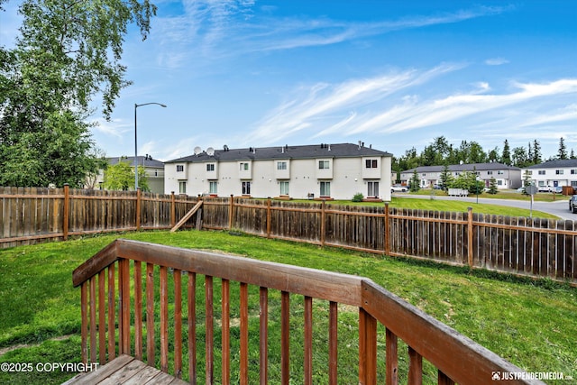 221 Whisper Ridge Cir # A, Anchorage, AK 99504 - fenced backyard featuring a residential view