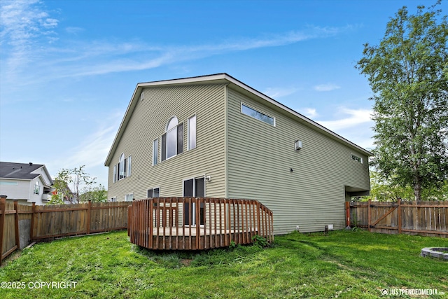 221 Whisper Ridge Cir # A, Anchorage, AK 99504 - back of house featuring a wooden deck and a fenced backyard