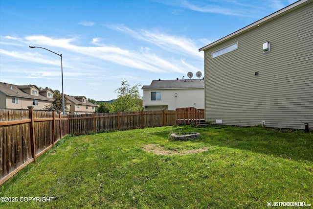221 Whisper Ridge Cir # A, Anchorage, AK 99504 - fenced yard with a residential view