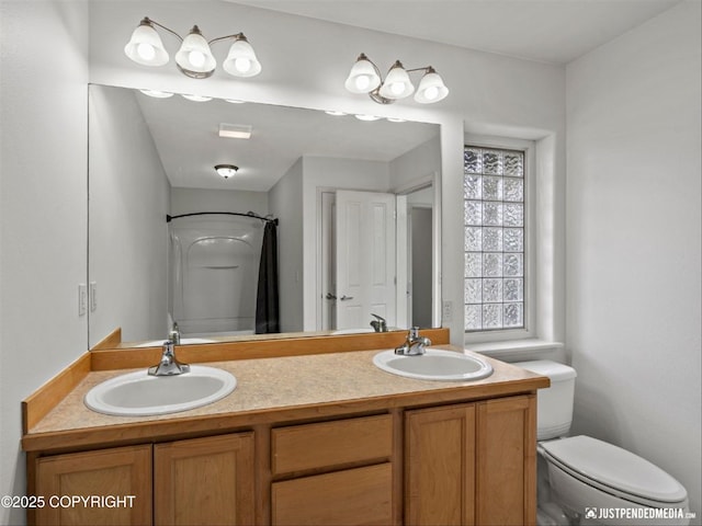 221 Whisper Ridge Cir # A, Anchorage, AK 99504 - bathroom with double vanity and a shower with curtain