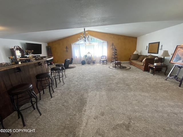 3411 Eagle Ave, Valdez, AK 99686 - living area with carpet floors, a dry bar, and lofted ceiling