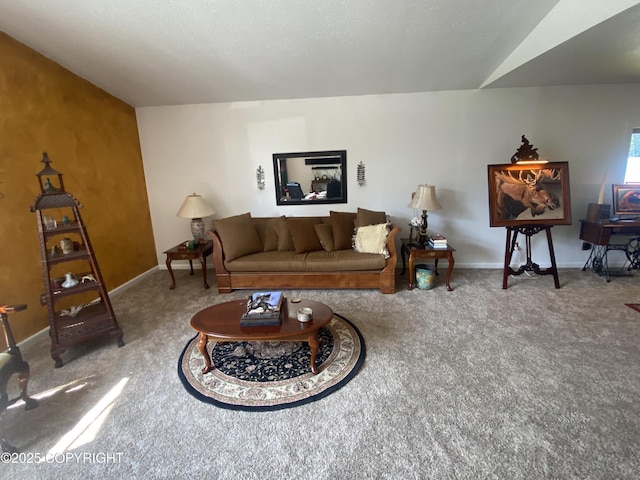 3411 Eagle Ave, Valdez, AK 99686 - carpeted living room featuring baseboards and vaulted ceiling