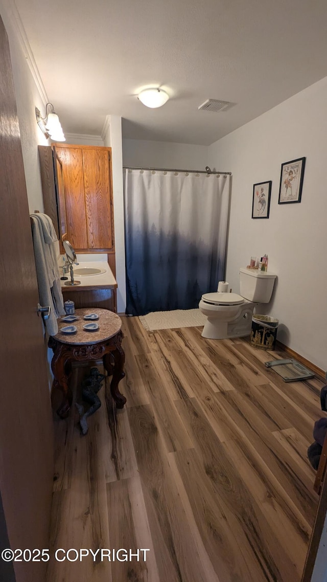3411 Eagle Ave, Valdez, AK 99686 - full bathroom featuring wood finished floors and curtained shower