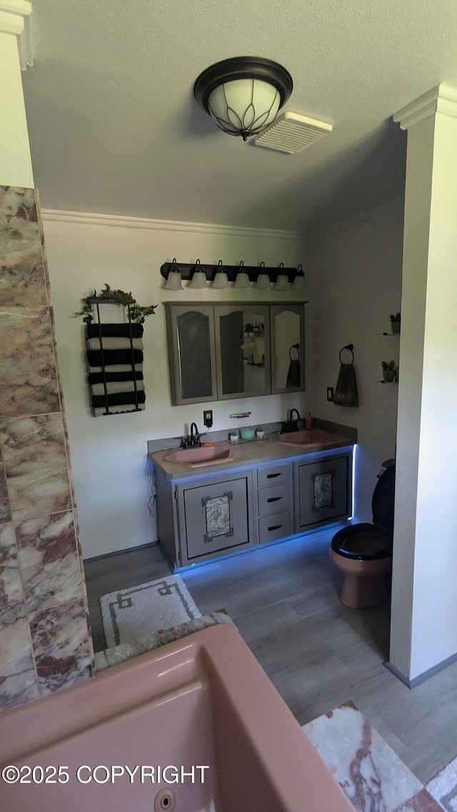 3411 Eagle Ave, Valdez, AK 99686 - full bathroom featuring double vanity and crown molding